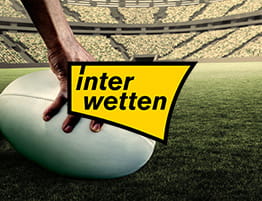 ένα ράγκμπι στιγμιότυπο και το λογότυπό του interwetten