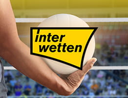 ένα βόλεϊ στιγμιότυπο και το λογότυπό του interwetten