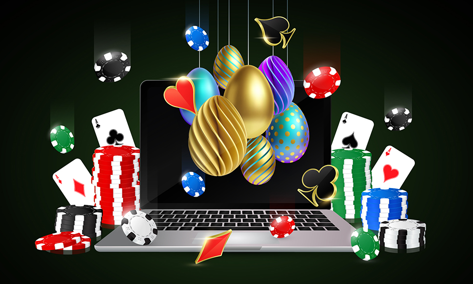 Laptop με πασχαλινά αυγά, μάρκες και τραπουλόχαρτα καζίνο